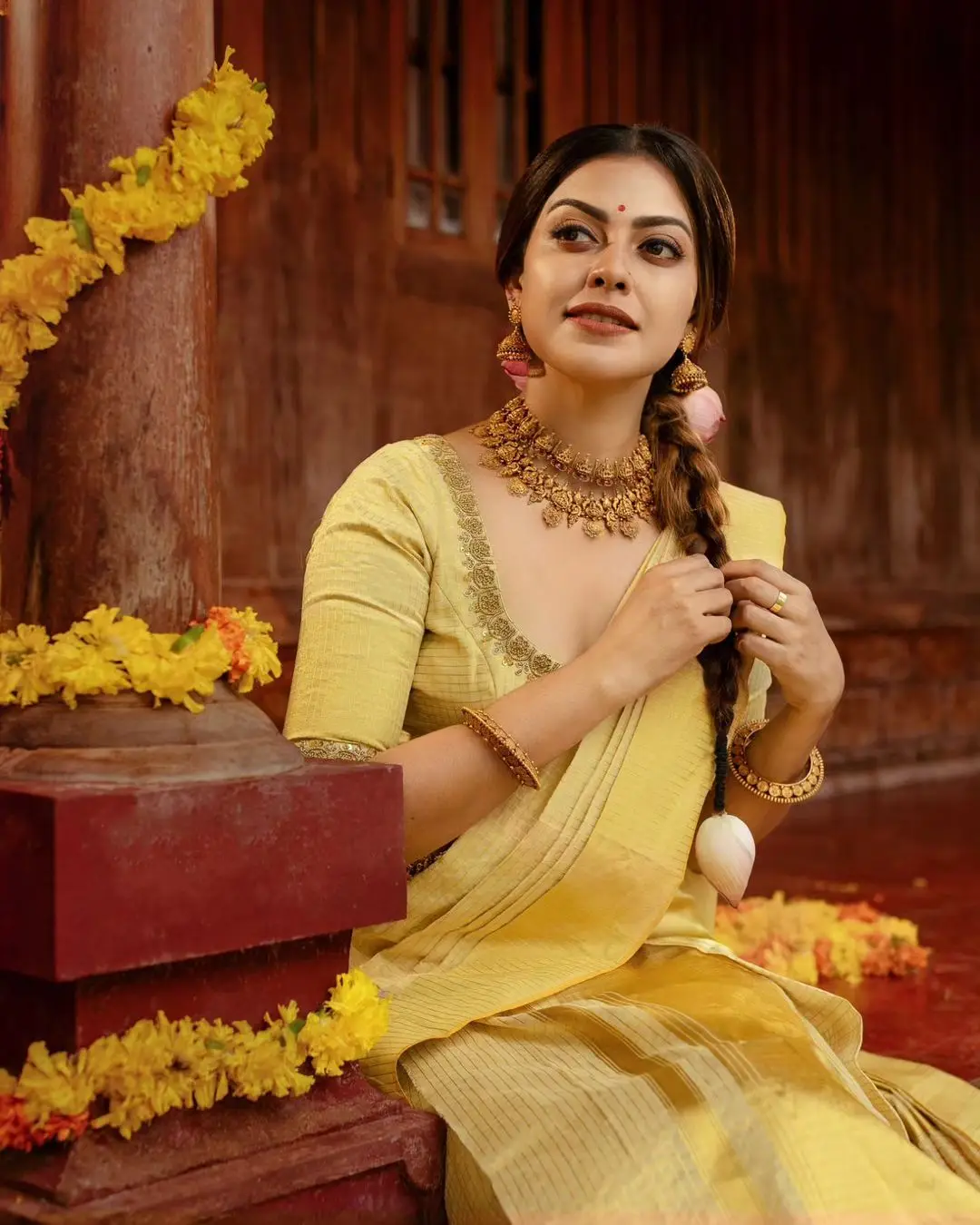 Anusree Nair Wearing Beautiful Earrings Jewellery Yellow Saree Blouse